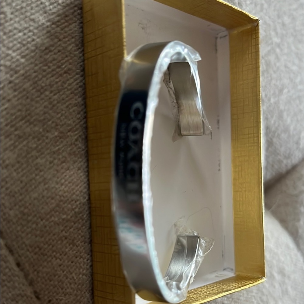 Coach Silver Arm & Wristband Clip